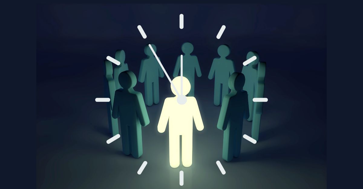Illuminated symbolic representation of team dynamics featuring eight human figures arranged in a circle against a dark backdrop. A central glowing yellow figure stands out, surrounded by seven dimmer green silhouettes, with white lines connecting them to emphasize interconnectedness. The bright central figure symbolizes leadership or a pivotal role, while the radiant light suggests influence, guidance, or strategic positioning within a group. The minimalist design highlights themes of collaboration, hierarchy, and collective focus, with the stark contrast between light and shadow underscoring the balance between individual prominence and team cohesion.
