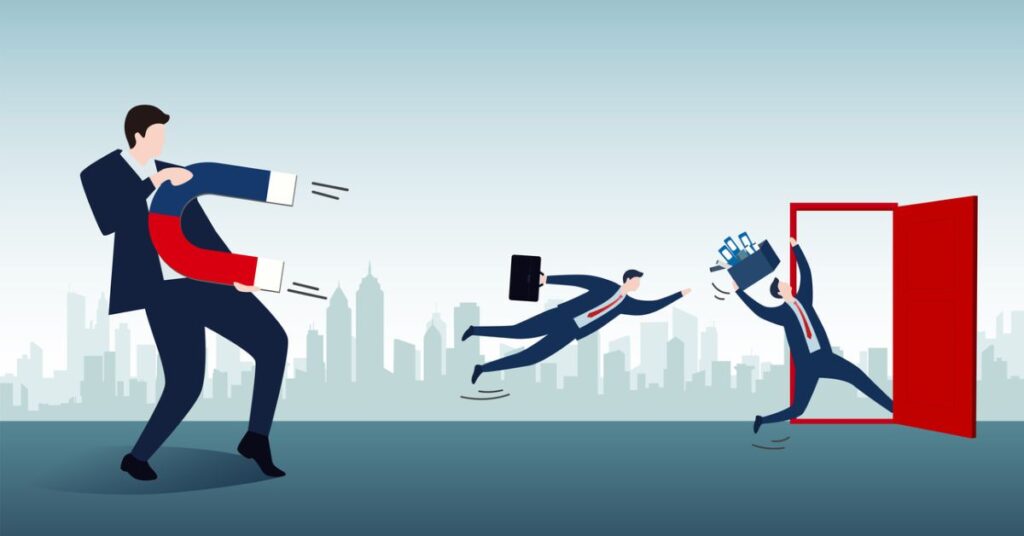 A cartoon illustration depicting a competitive business recruitment scenario. A suited man on the left wields a large red-and-white magnet, pulling two other businessmen toward him. The first man (center) flies backward, clutching a briefcase, while the second (right) struggles to resist, his tie caught by the magnet as he exits a red doorway. The background features a muted city skyline, emphasizing a corporate environment. The exaggerated physics and dynamic poses humorously convey themes of talent acquisition, workplace competition, and the allure of opportunities in a bustling business landscape.