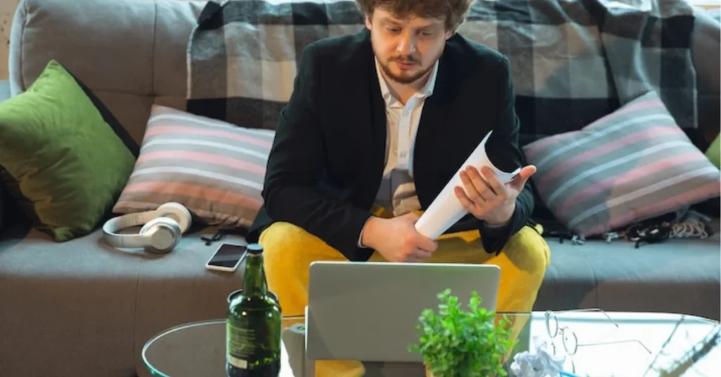 Preparing his life coaching business from home.